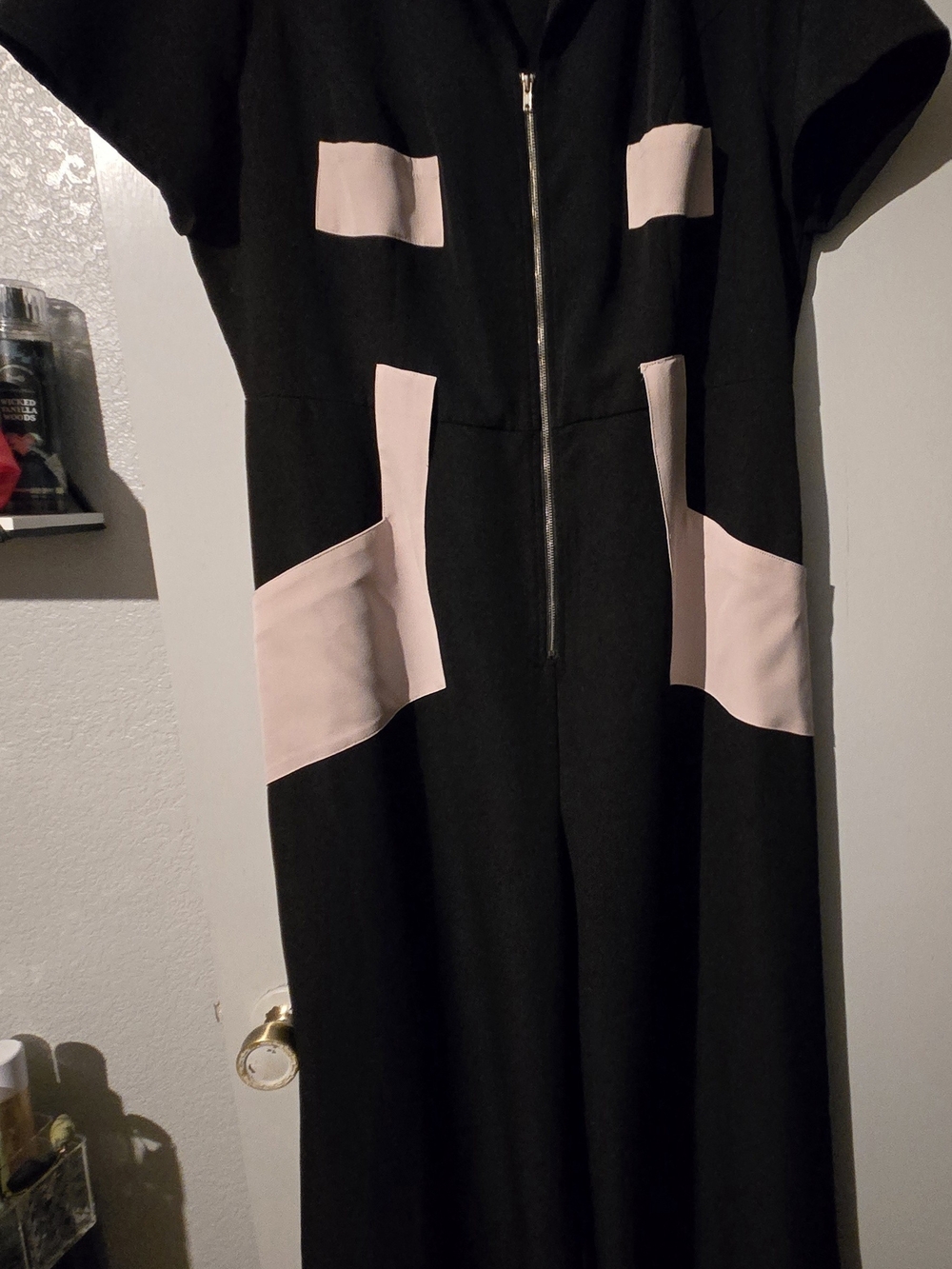 Black Jumpsuit with Blush Accent Panels and Front Zip